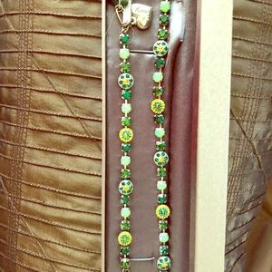 Mariana emerald jeweled necklace and bracelet.